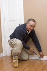 Tony Tourville putting finishing touches on Moose River Inn bed and breakfast.