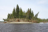 Upriver end of Charles Island showing erosion caused by ice. Charles Island is in the Moose River between Moosonee and Moose Factory, Ontario and is the site of Tidewater Provincial Park.